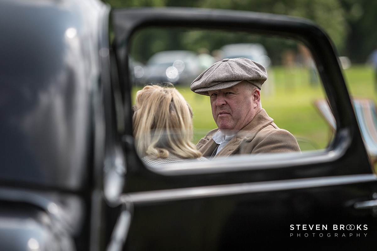 Britain Does Vintage Stody Lodge Norfolk photographer steven brooks photographs Britain Does Vintage at Stody Lodge man in cloth cap