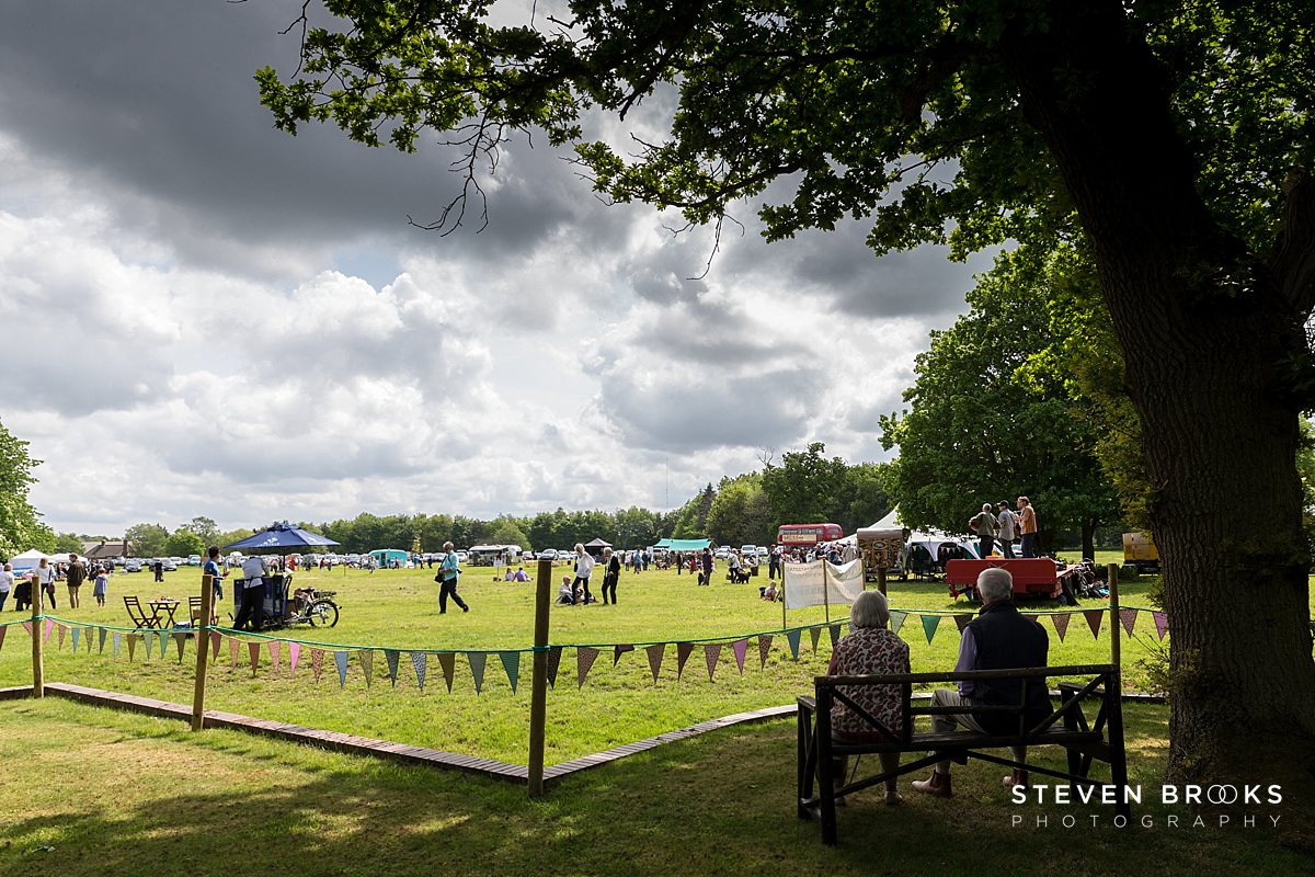 Britain Does Vintage Stody Lodge Norfolk photographer steven brooks photographs a coupole under a tree at Britain Does Vintage at Stody Lodge
