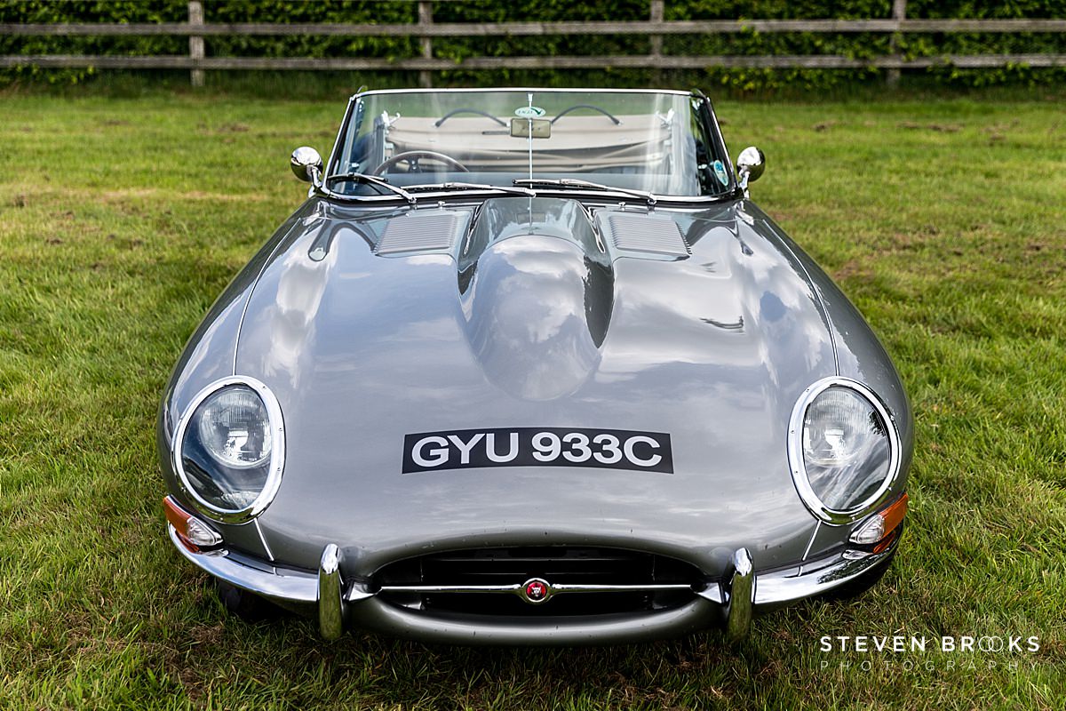 Britain Does Vintage Stody Lodge Norfolk photographer steven brooks photographs a vintage E-Type Jaguar at Britain Does Vintage at Stody Lodge