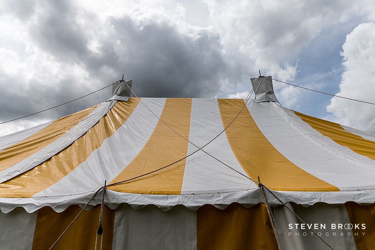 Britain Does Vintage Stody Lodge Norfolk photographer steven brooks photographs a marquee roof and clouds at Britain Does Vintage at Stody Lodge