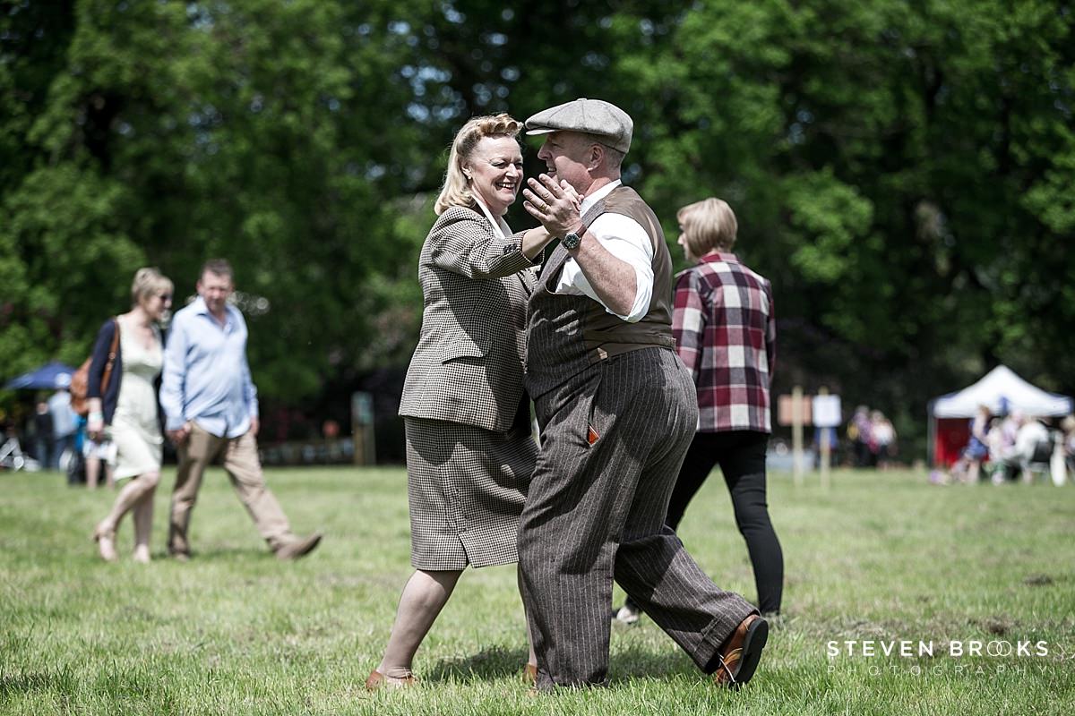 Britain Does Vintage Stody Lodge Norfolk photographer steven brooks photographs a couple dancing a waltz in vintage clothes at Britain Does Vintage at Stody Lodge