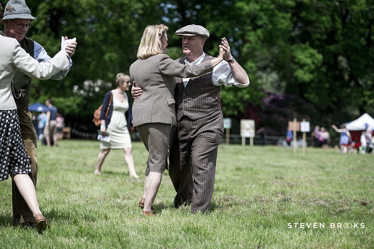Britain Does Vintage Stody Lodge Norfolk photographer steven brooks photographs a couples dancing in vintage clothes at Britain Does Vintage at Stody Lodge