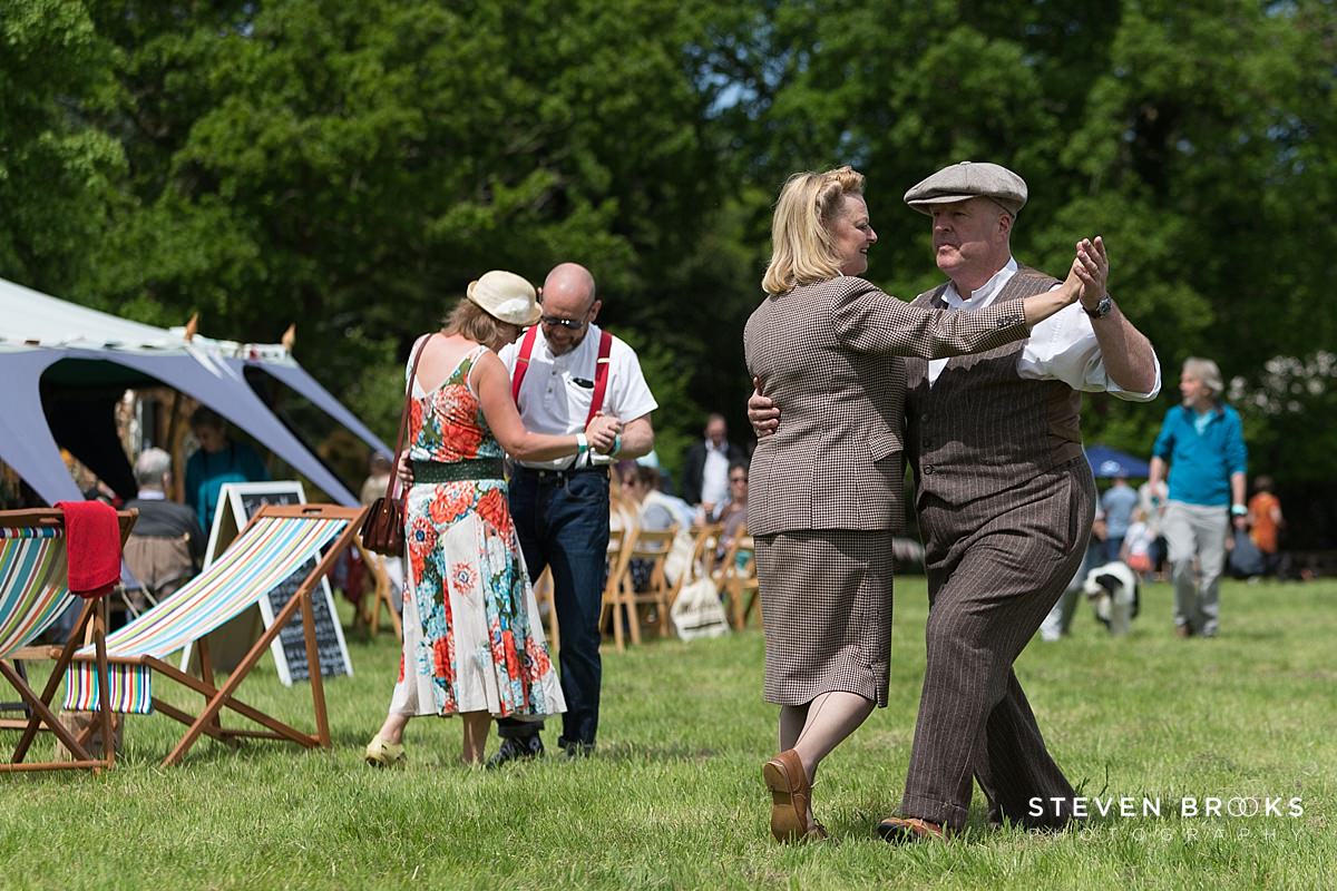 Britain Does Vintage Stody Lodge Norfolk photographer steven brooks photographs a couples dancing in vintage clothes to 40's style music at Britain Does Vintage at Stody Lodge