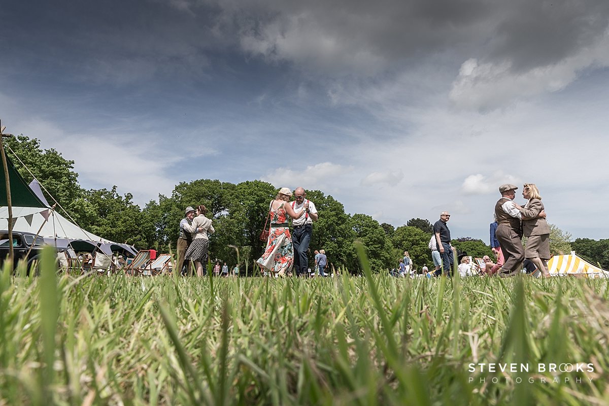Britain Does Vintage Stody Lodge Norfolk photographer steven brooks photographs couples dancing from ground level in vintage clothes to 40's style music at Britain Does Vintage at Stody Lodge