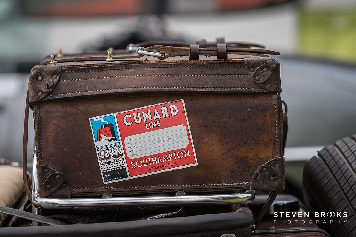 Britain Does Vintage Stody Lodge Norfolk photographer steven brooks photographs an old leather luggage suit case at Britain Does Vintage in Norfolk