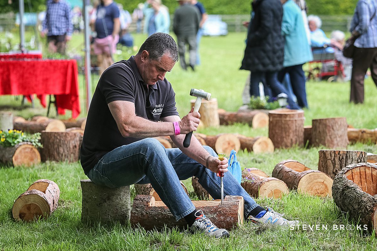 Britain Does Vintage Stody Lodge Norfolk photographer steven brooks photographs a wood craftsman at Britain Does Vintage in Norfolk