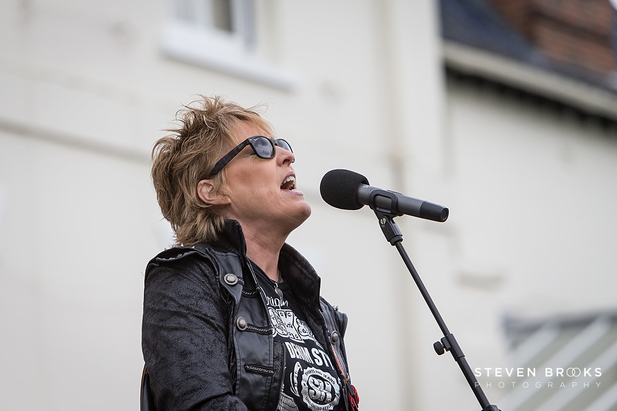 Britain Does Vintage Stody Lodge Norfolk photographer steven brooks photographs a close up of Katrina from Katrina and the Waves singing at Britain Does Vintage in Norfolk